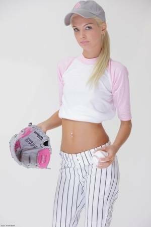 Baseball cutie Francesca loses her uniform to expose her skinny teen body on dollser.com