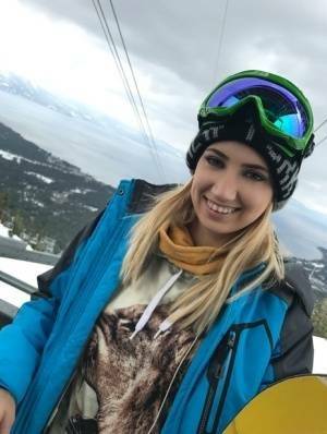 Clothed teens Kristen Scott & Sierra Nicole don ski masks while snowboarding on dollser.com