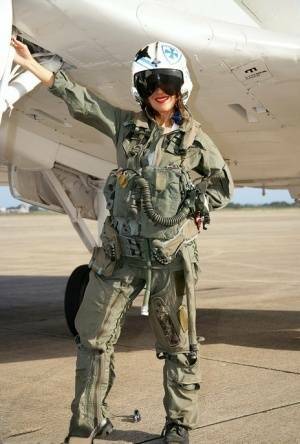 Sizzling mature babe Roni strips from military air force uniform on dollser.com