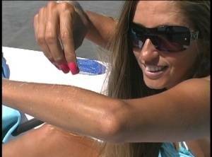Amateur model Lori Anderson exhibits her hairy forearms in sunglasses on dollser.com