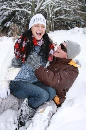 Teen girl opens her mouth for a cumshot after fucking in the snow on dollser.com