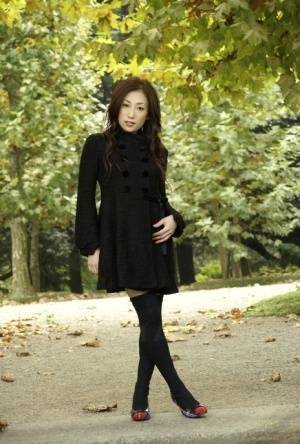 Fully clothed Japanese teen models in the park in black clothes and stockings - Japan on dollser.com