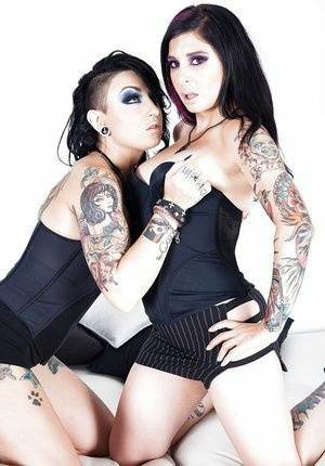 Goth models play with their tatted tight bodies and pussies on dollser.com