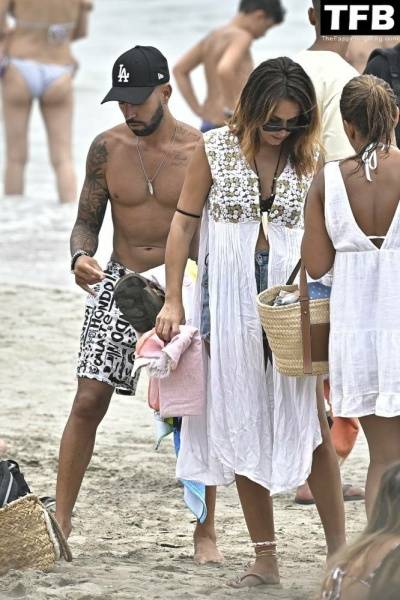 Raquel Lozano Flaunts Her Curves on the Beach in Ibiza on dollser.com