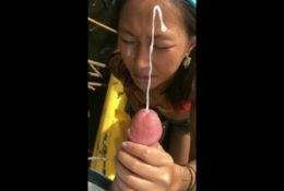 Tiny Asian gets covered in Cum on dollser.com