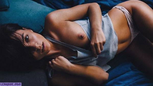 Anastasiia Poranko topless in bed on dollser.com