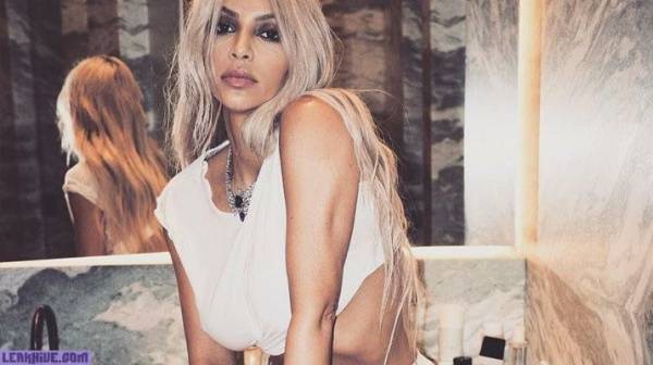 Kim Kardashian sexy transparent tits on dollser.com