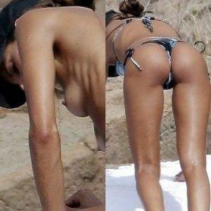 Delphine IZABEL GOULART TOPLESS ON A NUDE BEACH on dollser.com