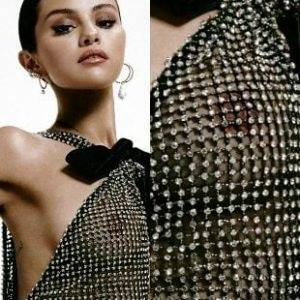 Delphine SELENA GOMEZ SHOWS HER NIPPLE IN A SEE THRU DRESS on dollser.com