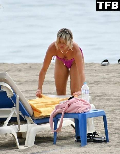 Ashley Roberts Enjoys the Beach on Holiday in Marbella on dollser.com