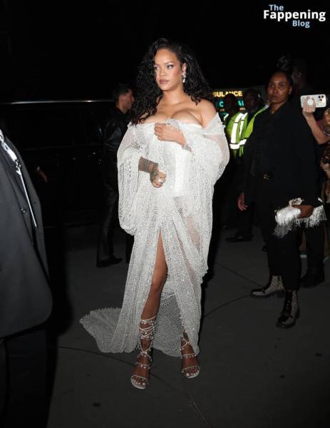 Rihanna Displays Her Curves in a White Dress (13 Photos) on dollser.com