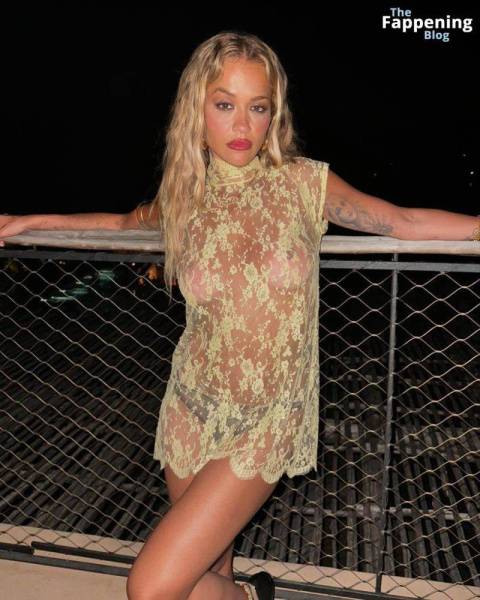 Rita Ora Shows Off Her Nude Boobs While Posing in a Sheer Dress (2 Photos) on dollser.com